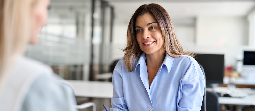 Happy,Middle,Aged,Business,Woman,Hr,Talking,To,Recruit,At